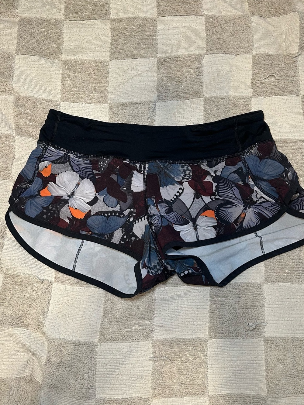 lululemon athletica Black Floral & Butterfly Athletic Shorts with Orange Accents